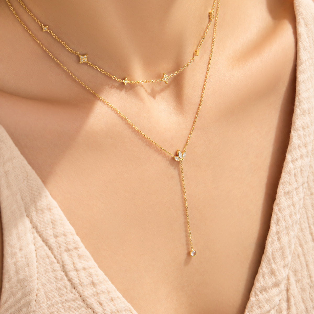 18K gold PVD zircon Y necklace styled with a matching layered necklace