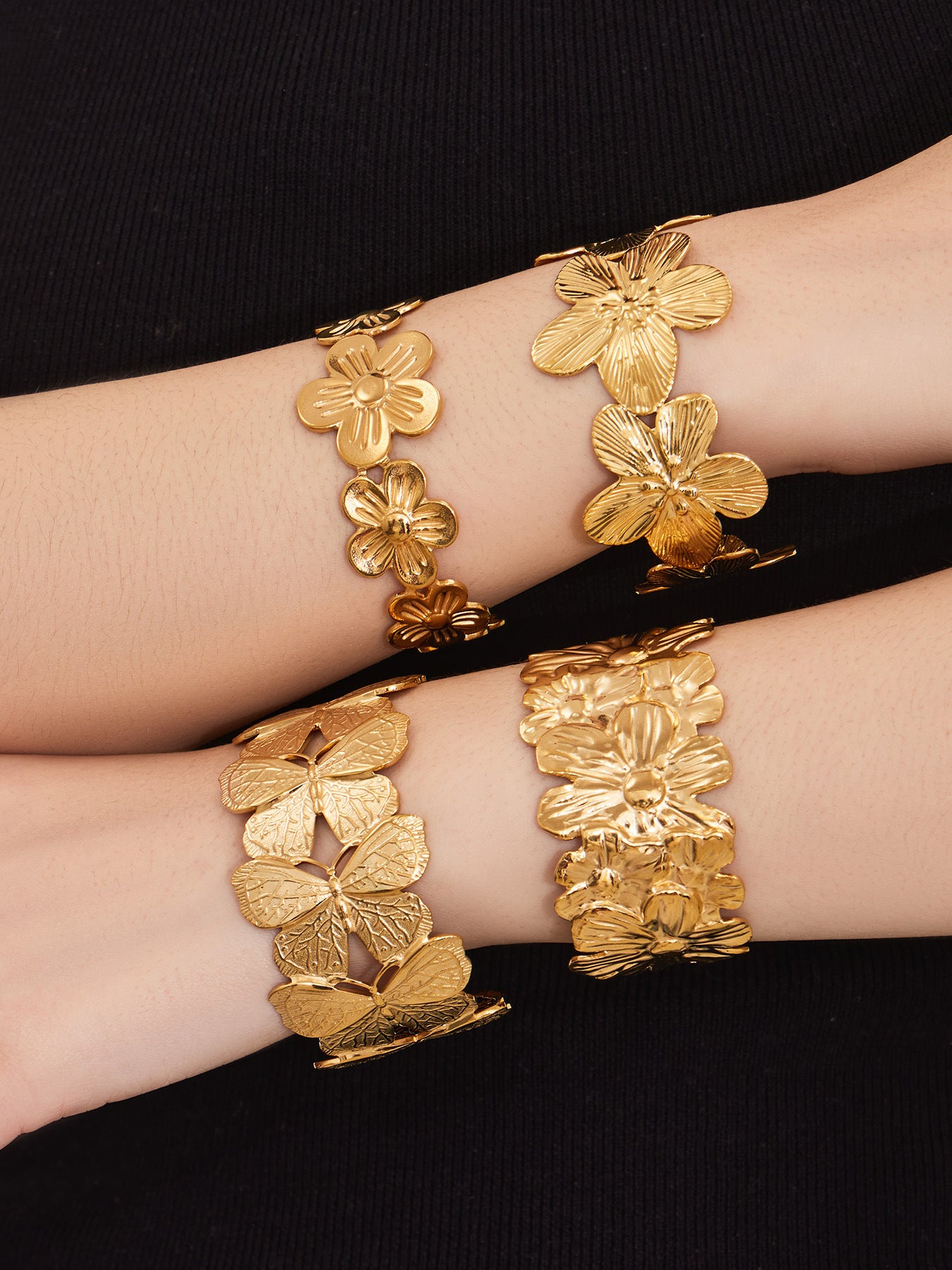 316L stainless steel 18K Gold Plated Filigree Floral Butterfly Open Bangle flat lay display for wholesale bangle buyers