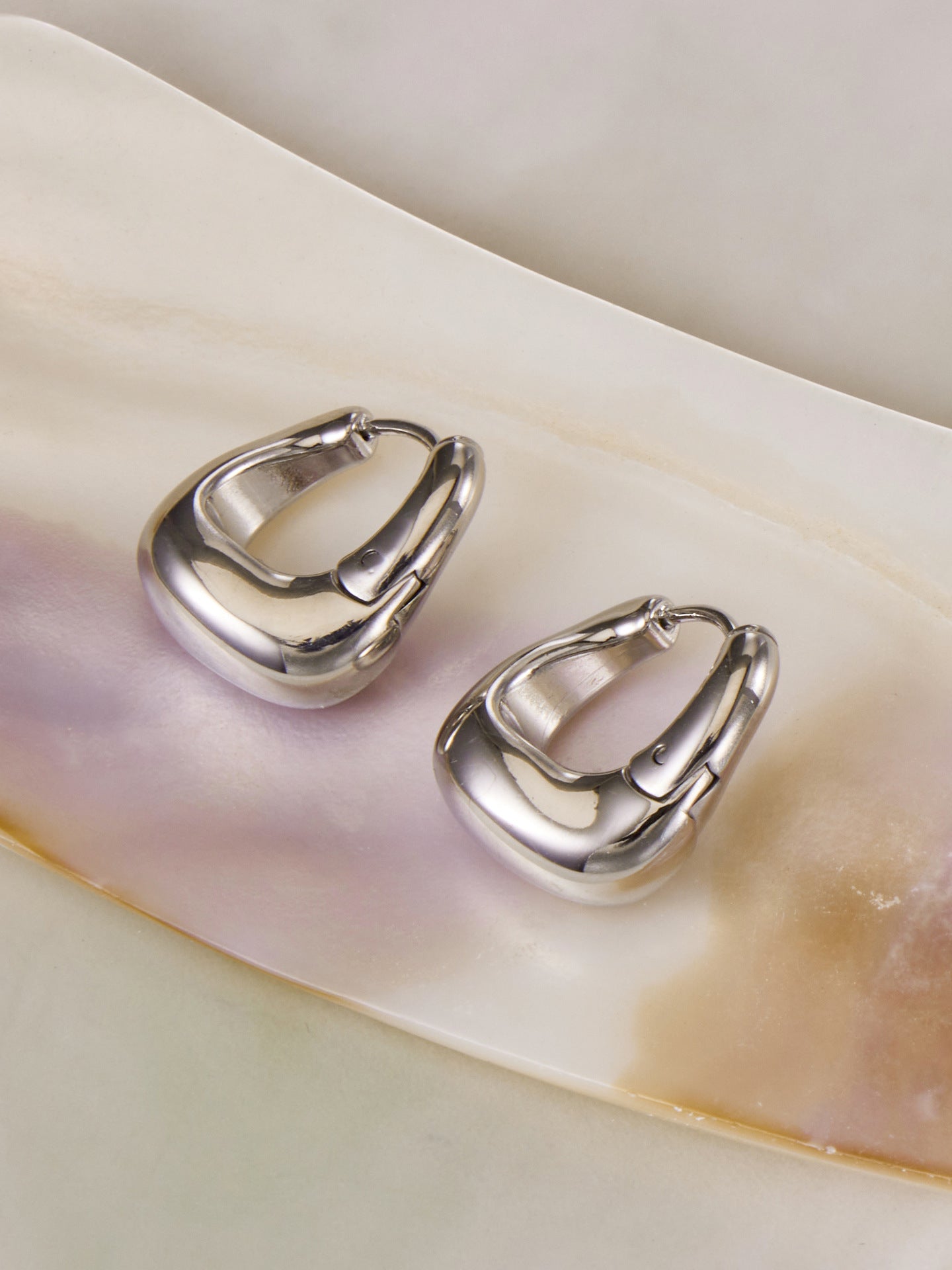 316L stainless steel 18K Gold PVD Oval Huggie Hoop Earrings close-up detail view for wholesale earrings buyers