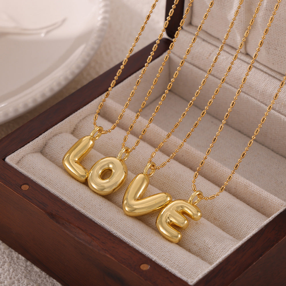 316L Stainless Steel 18K PVD Gold Balloon Letter Necklace made with 316L stainless steel and 18K PVD gold finish for wholesale jewelry buyers - image 10