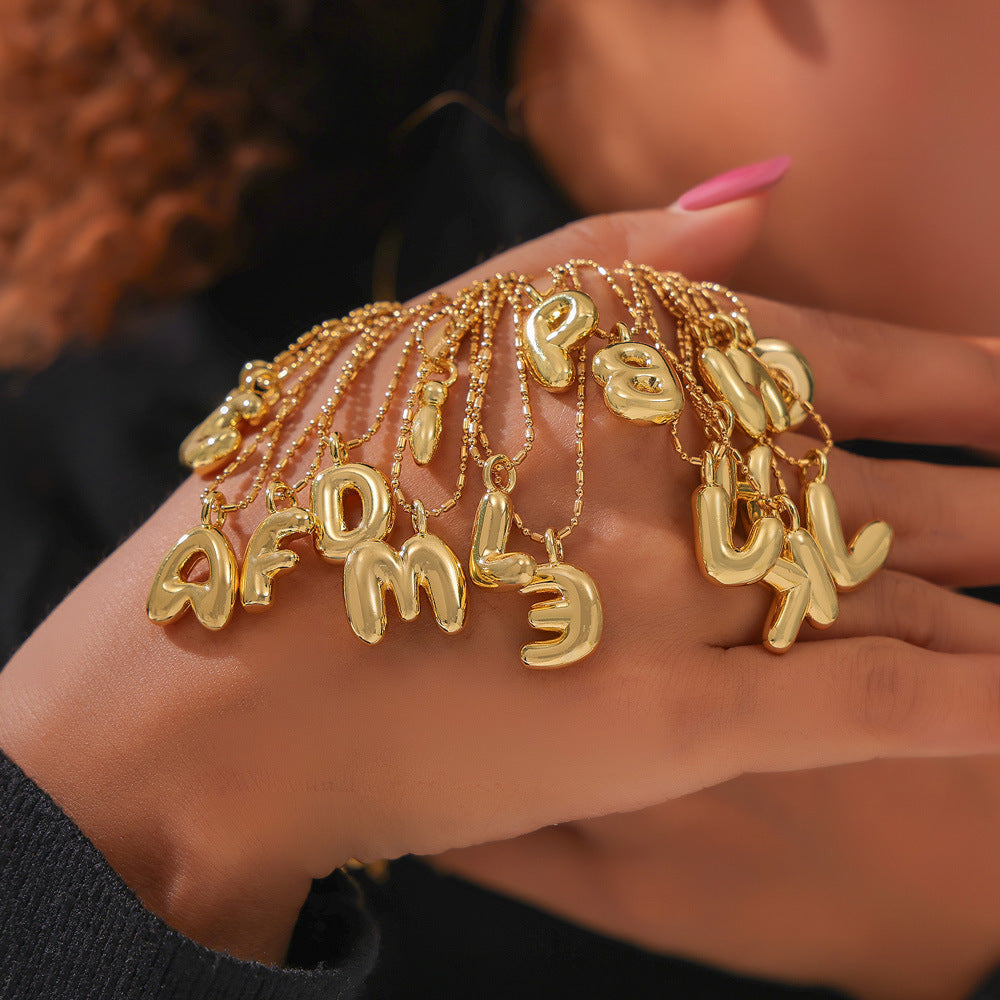 316L Stainless Steel 18K PVD Gold Balloon Letter Necklace made with 316L stainless steel and 18K PVD gold finish for wholesale jewelry buyers - image 11