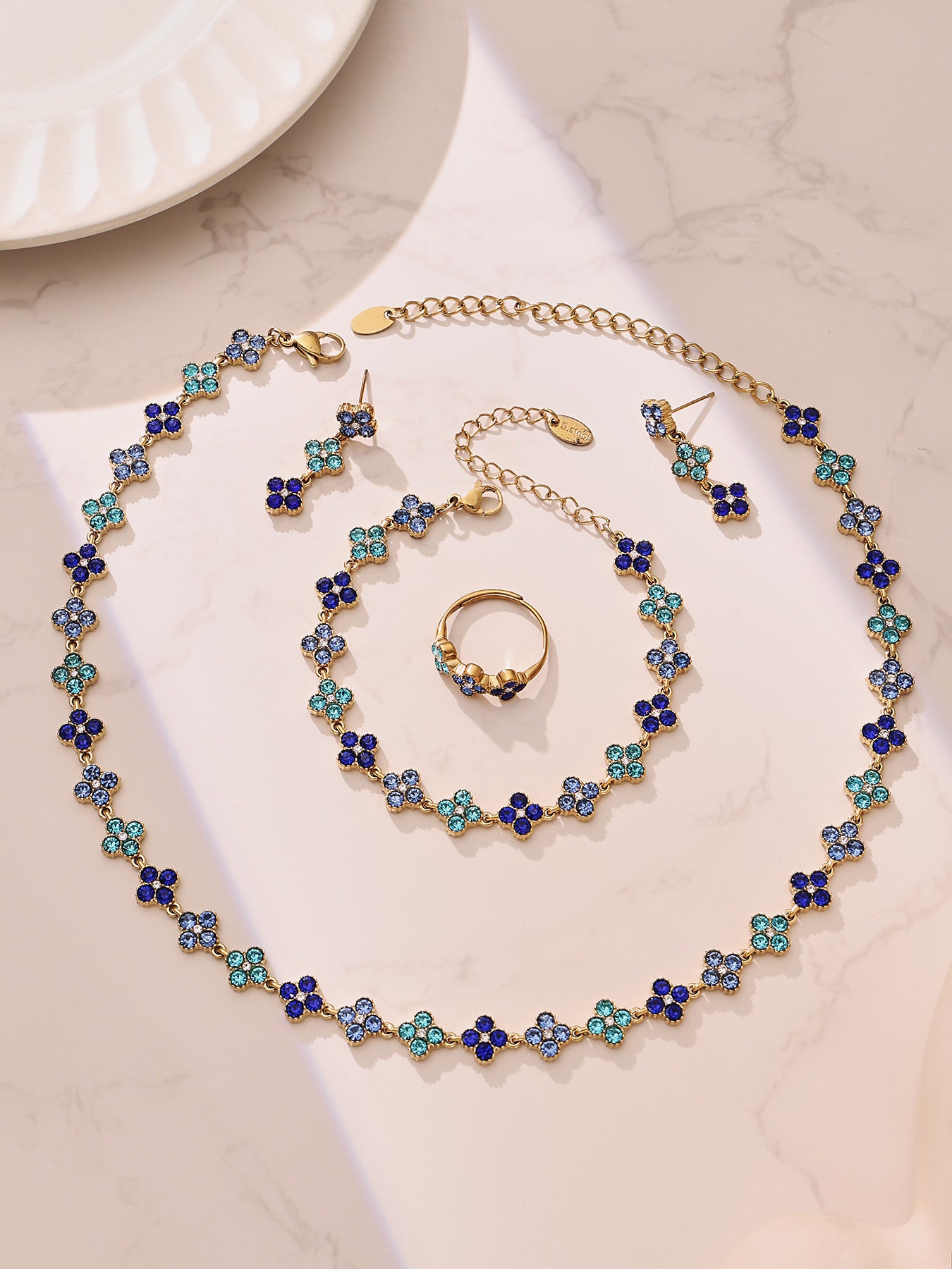316L Stainless Steel Dopamine Four-Leaf Zircon Jewelry Set – Ring Necklace Bracelet Earrings
