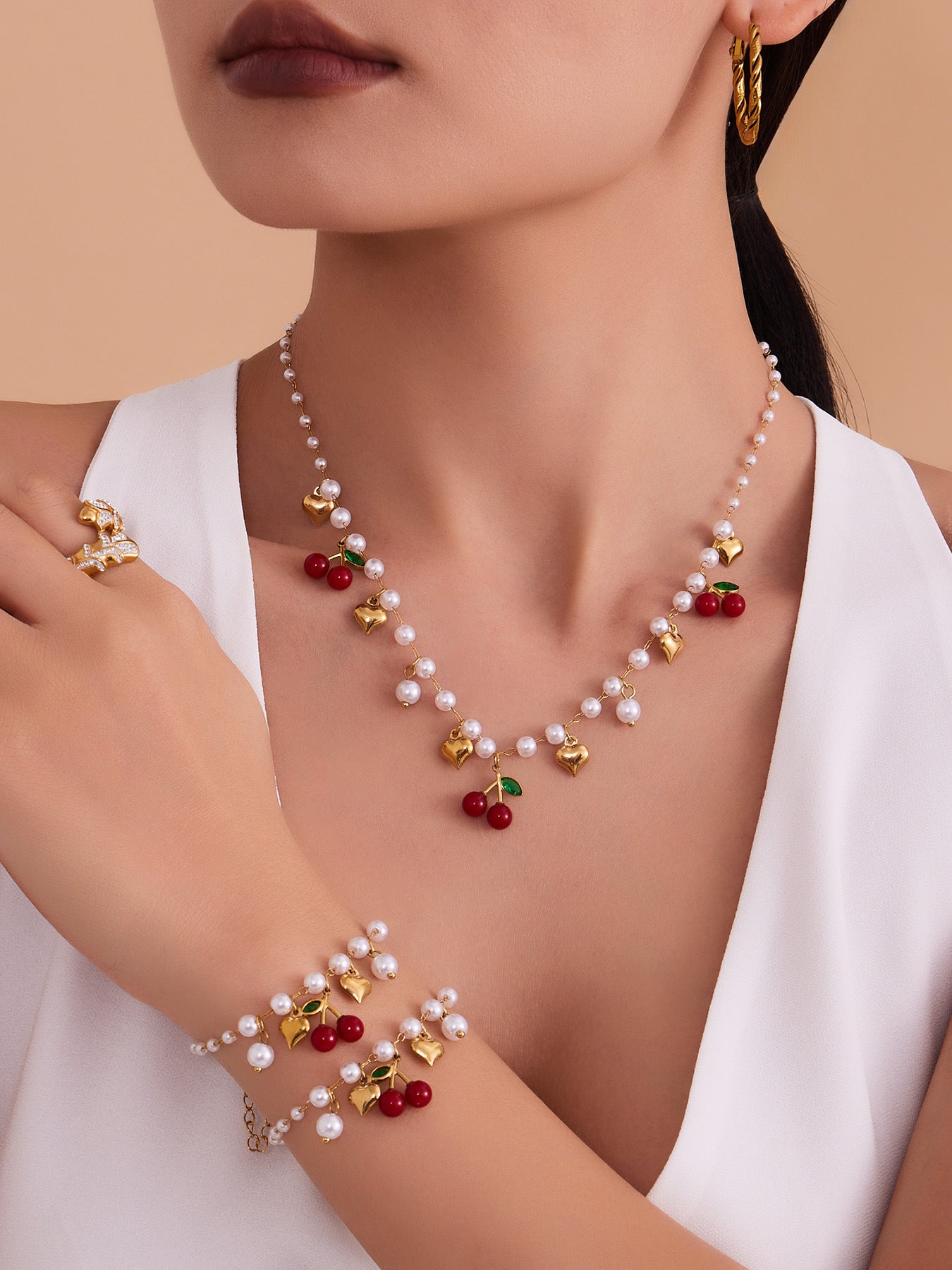 A model showcasing the waterproof chic beaded jewelry set, perfect for everyday wear and sensitive skin.