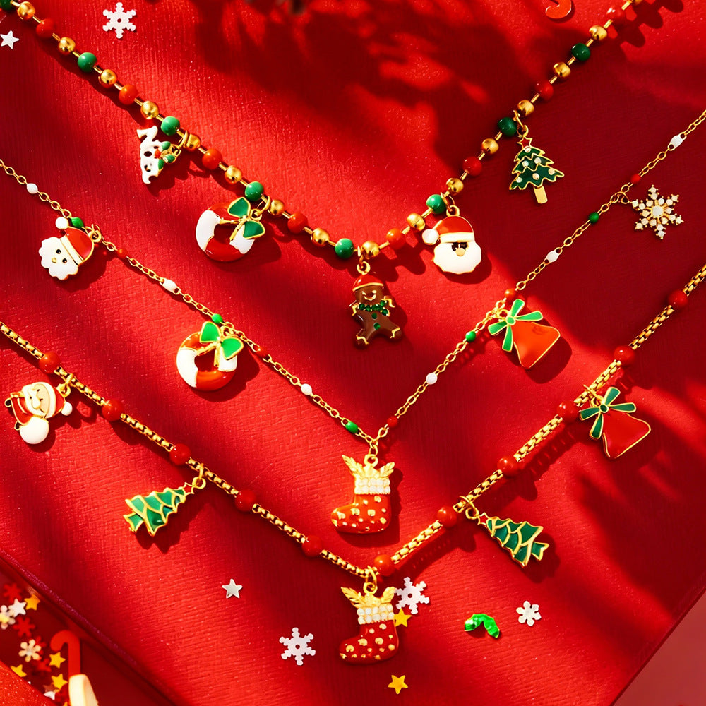 316L stainless steel Christmas beaded charm necklace flat lay with enamel Santa and stocking charms