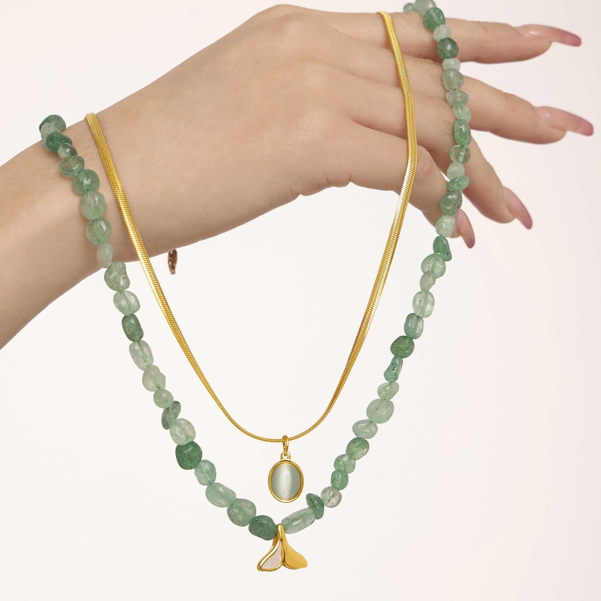 316L stainless steel Green Strawberry Stone & Aquamarine Layered Necklace flat lay display for wholesale necklace buyers