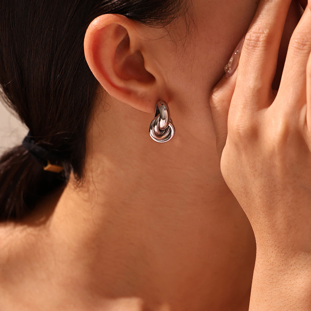 316L stainless steel Minimalist Intertwined Circle Stud Earrings modeled styling view for wholesale earrings buyers