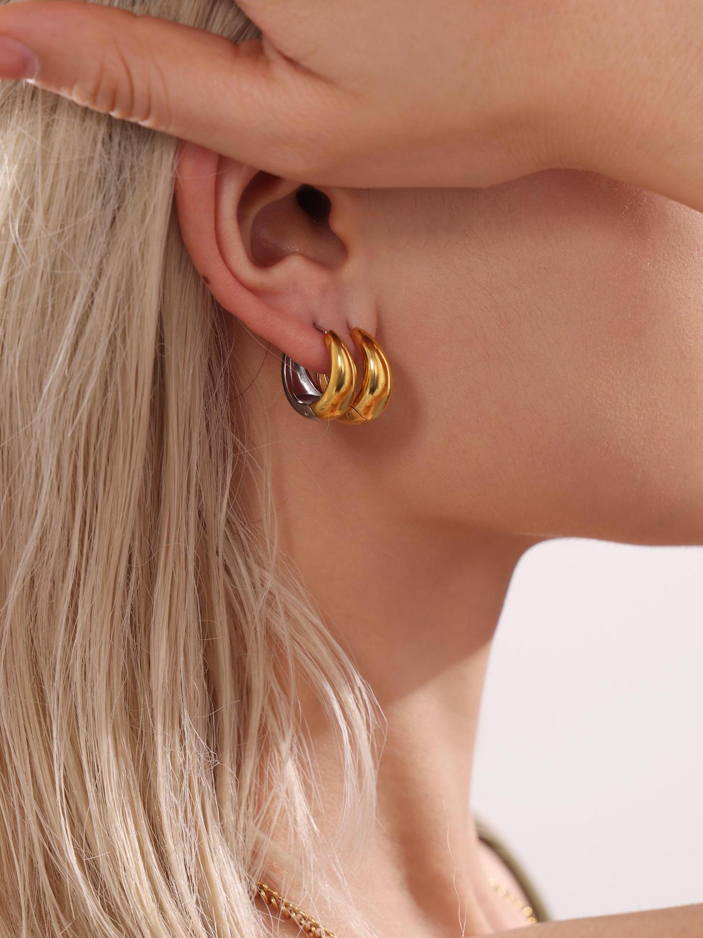 316L stainless steel Mixed Metal Two-Tone Teardrop Huggie Hoop Earrings modeled styling view for wholesale earrings buyers