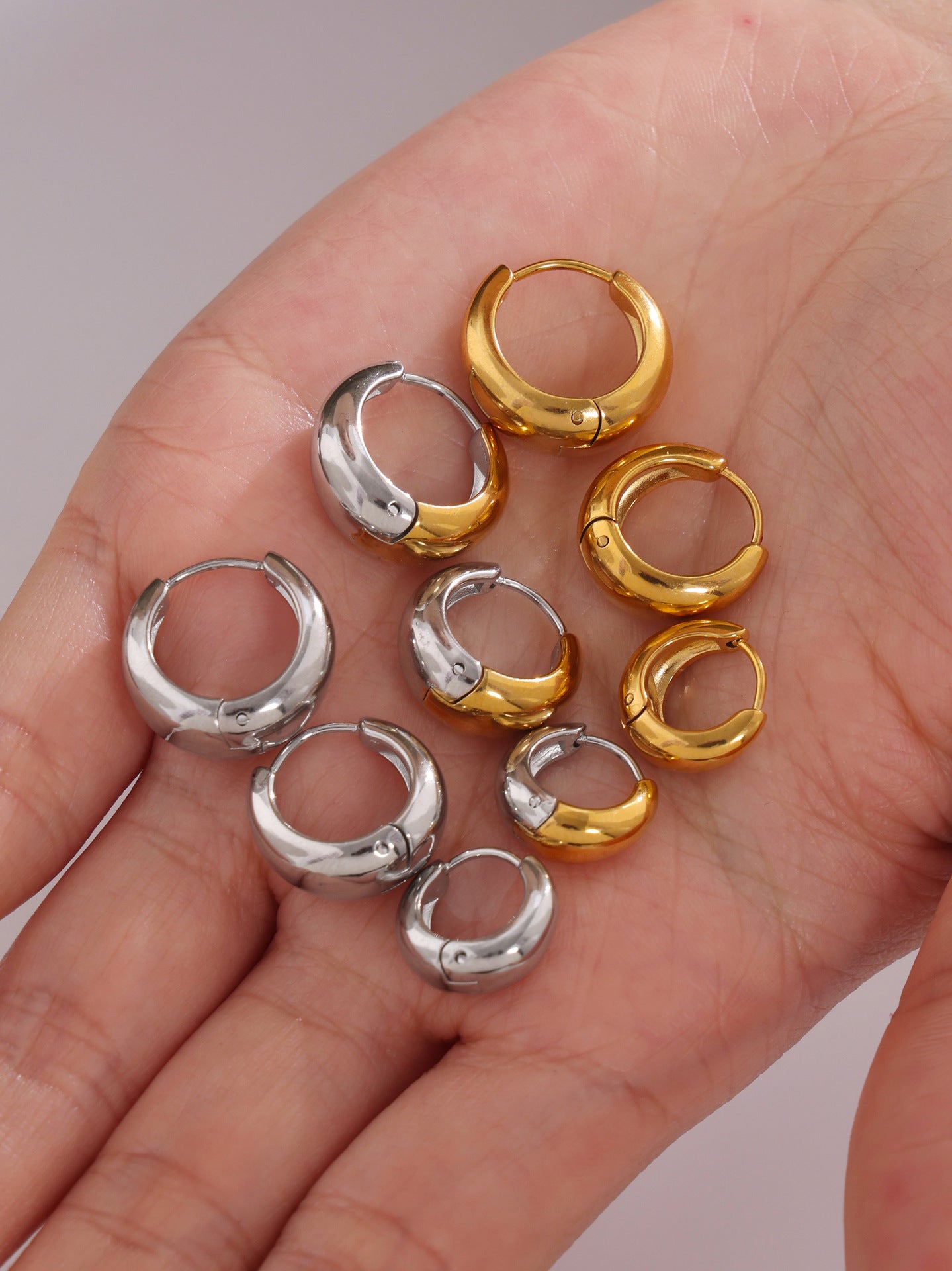 316L stainless steel Mixed Metal Two-Tone Teardrop Huggie Hoop Earrings side detail view for wholesale earrings buyers