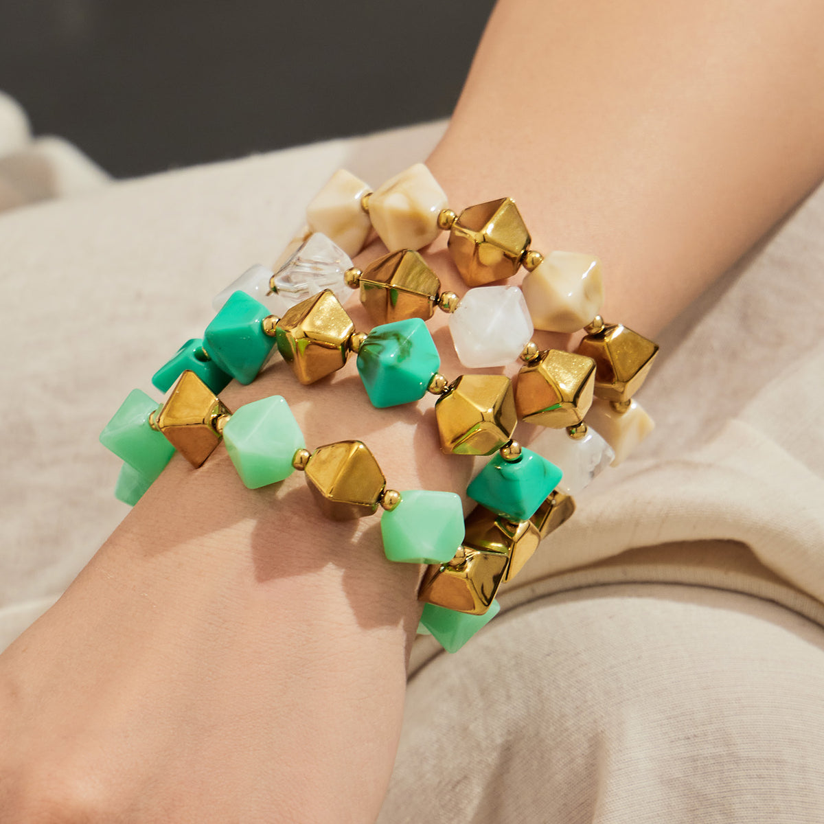 Green gold resin bracelet with stainless steel accents