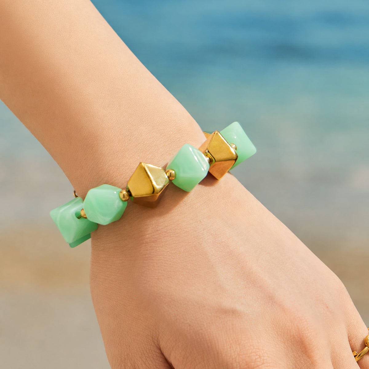 Yellow resin bracelet with stainless steel accents