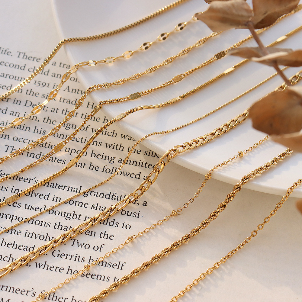 316L stainless steel 18K Gold Plated Minimalist Layering Chain Necklaces flat lay display for wholesale necklace buyers