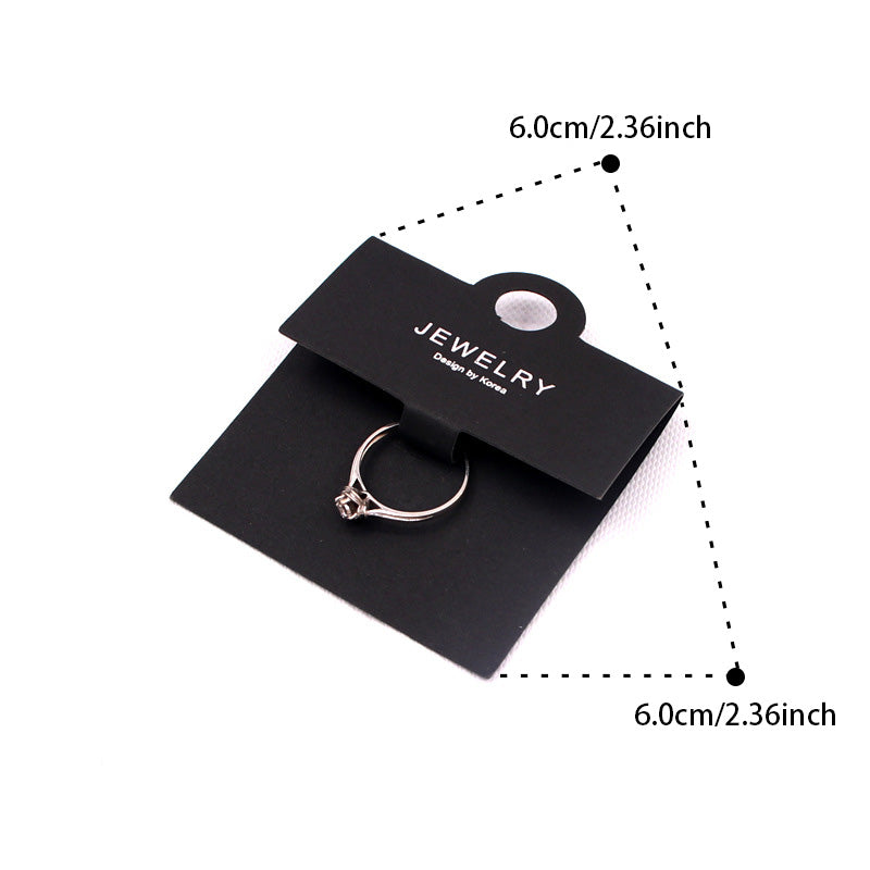 Black ring display card showing 6 × 6 cm size and product specification details
