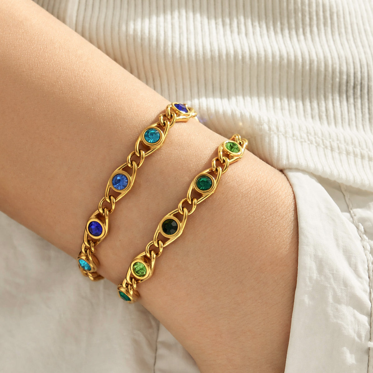 Blue and green zircon bracelets worn on wrist