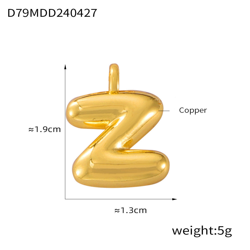 Close-up of the 316L stainless steel bubble letter pendant