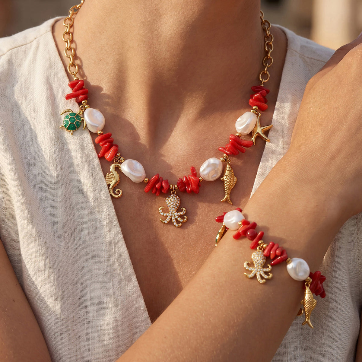 Coastal charm necklace and bracelet with colorful marine animal accents