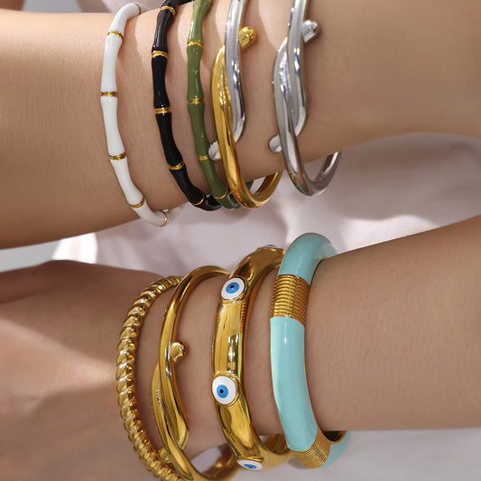 18k gold plated enamel stainless steel bangle set, model wearing on wrist