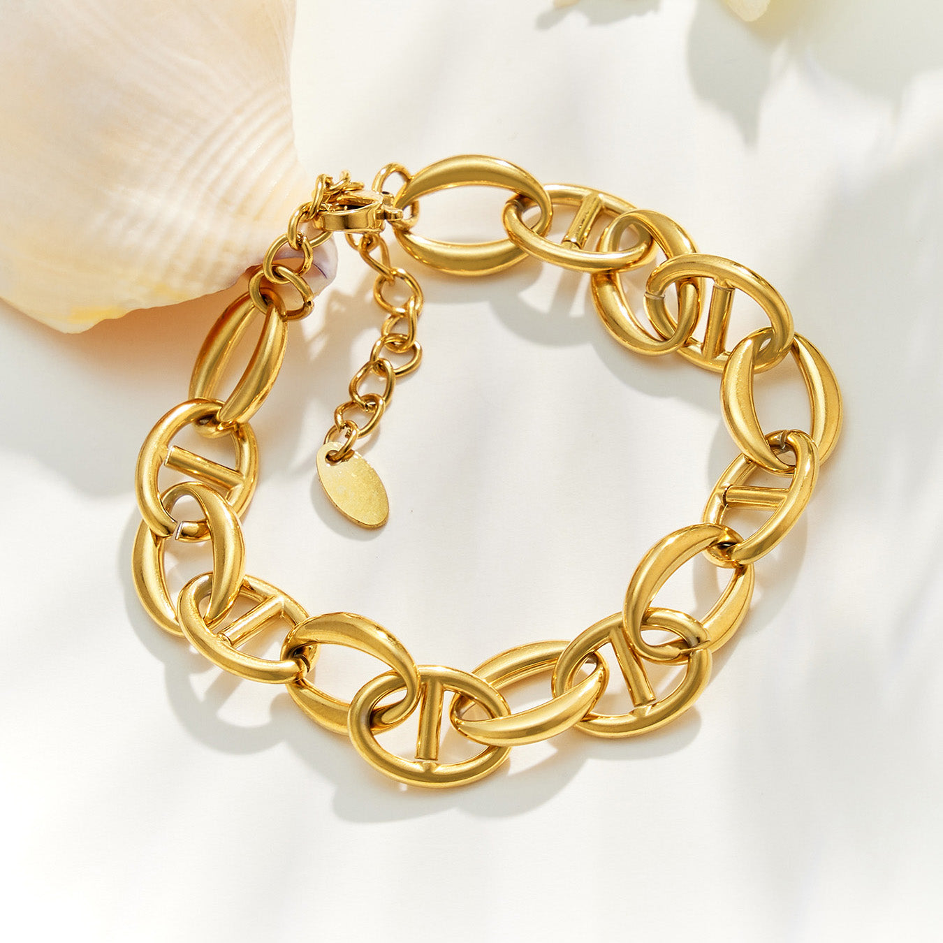 Plain gold oval link bracelet with chunky stainless steel chain design