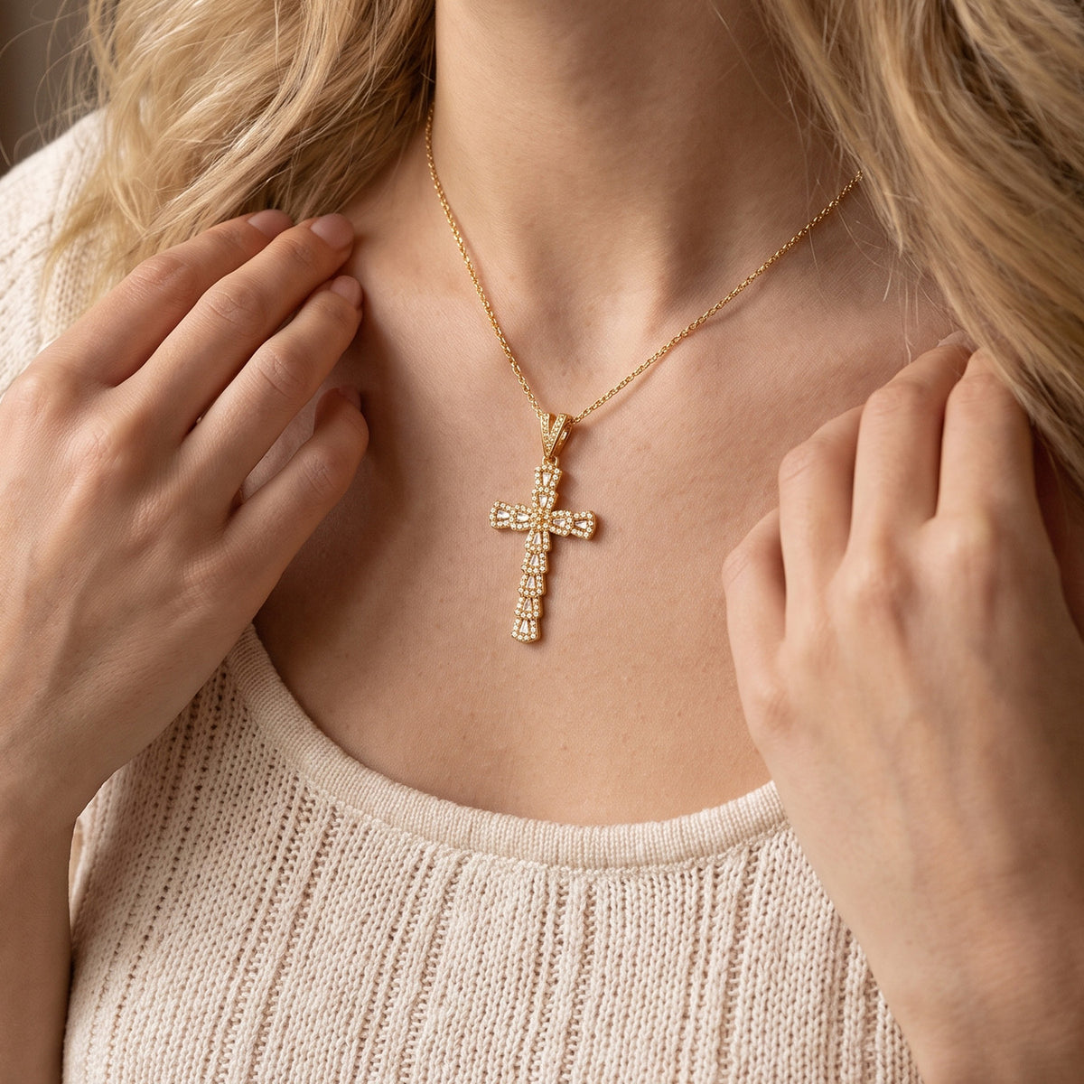 Gold cross necklace styled for everyday wear