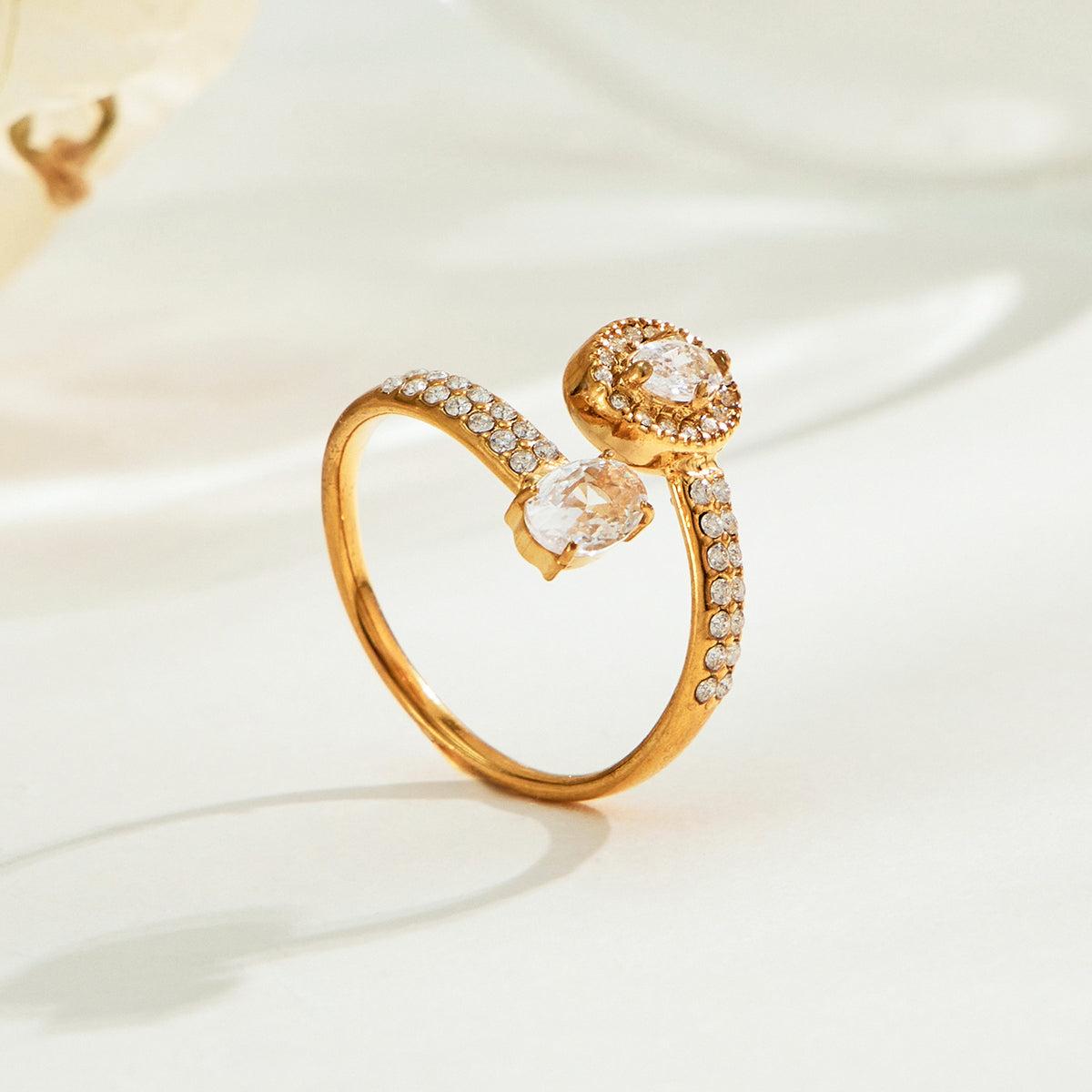 Gold-tone stainless steel double cubic zirconia open ring with pavé CZ accents