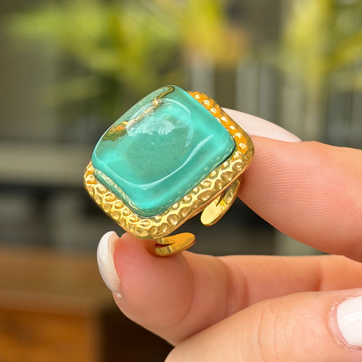 Green chunky resin statement ring with stainless steel open band close-up