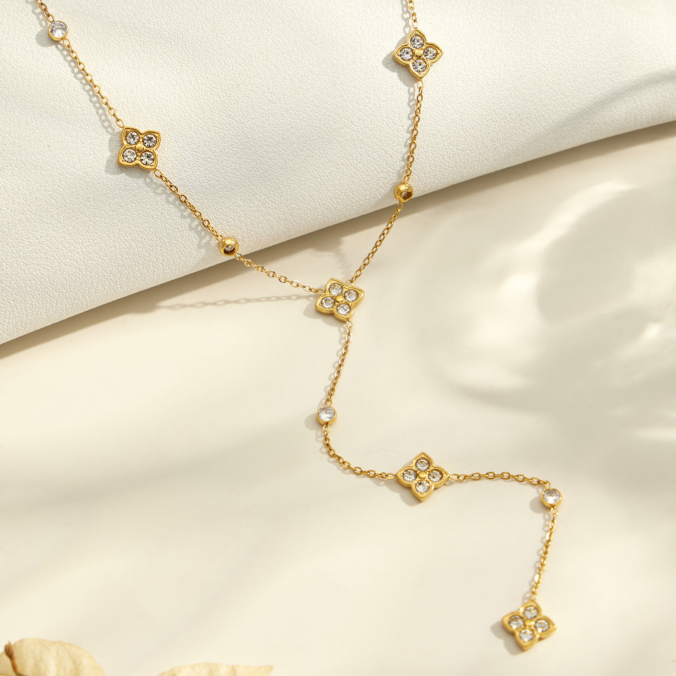Miduoduo Jewelry clover Y necklace and lightning zircon charm necklace displayed together
