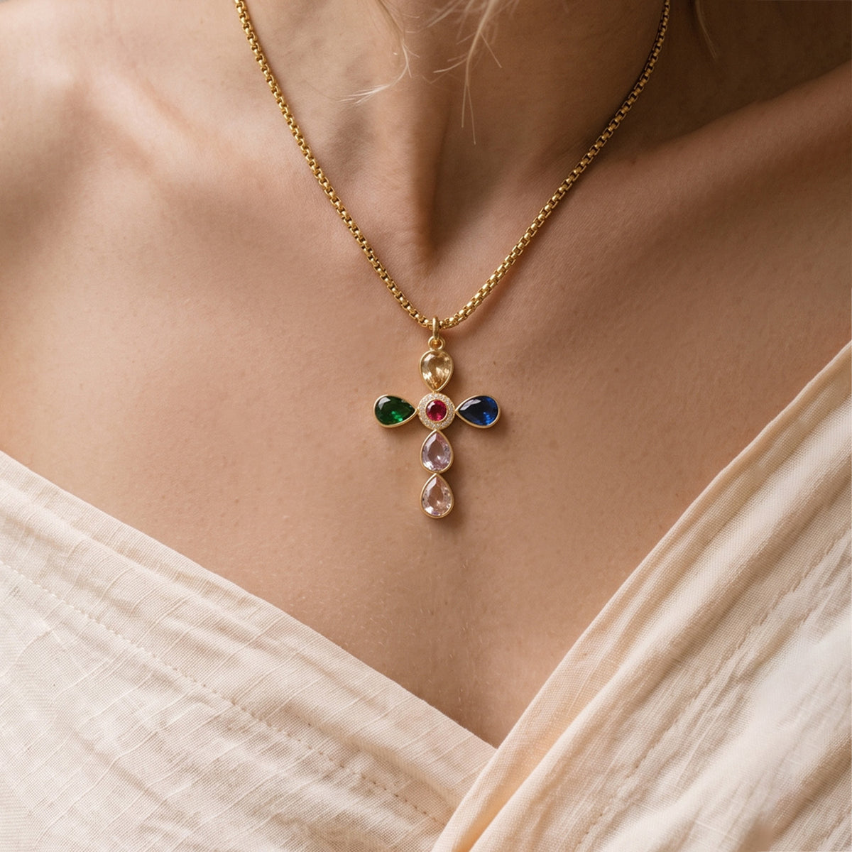 Multicolor stone-set cross pendant necklace styled on model
