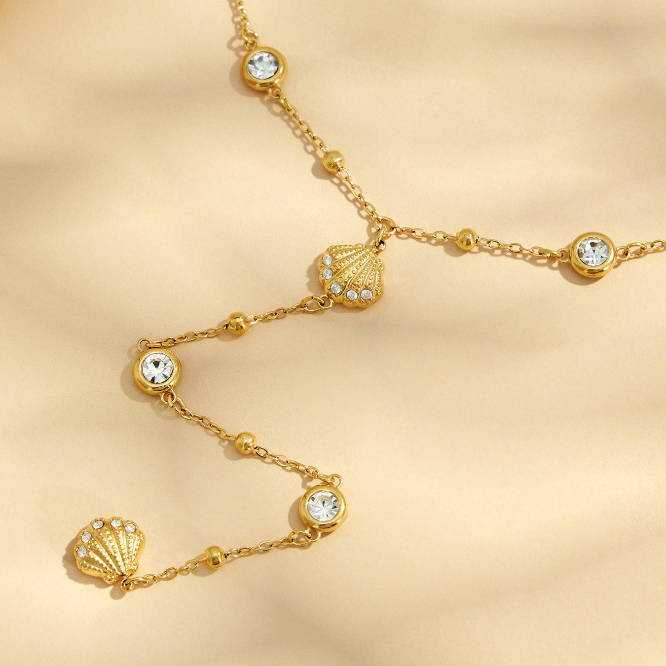 316L Stainless Steel 18K PVD Gold Ocean Shell Y-Shaped Necklace made with 316L stainless steel and 18K PVD gold finish for wholesale jewelry buyers - image 17