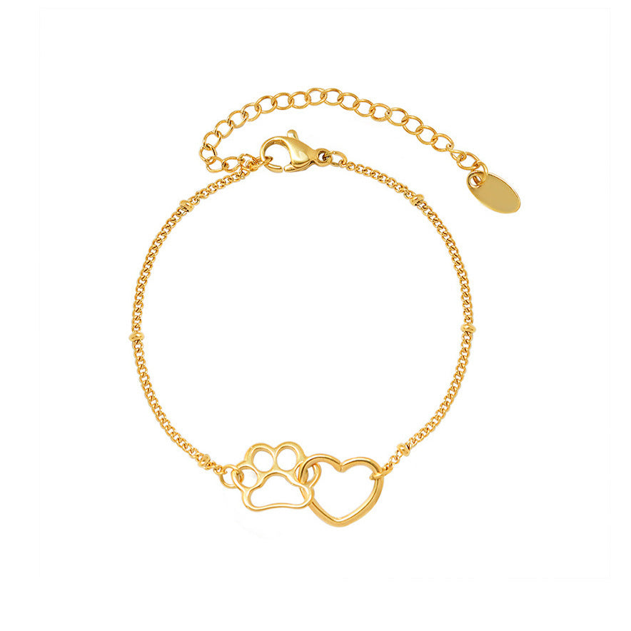 Gold paw print heart chain bracelet in waterproof stainless steel with adjustable extender