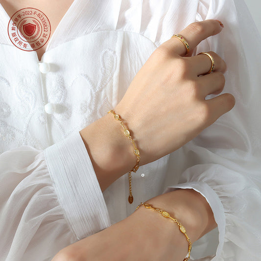 316L Stainless Steel Minimalist Tennis Racket Charm Bracelet - Image 1