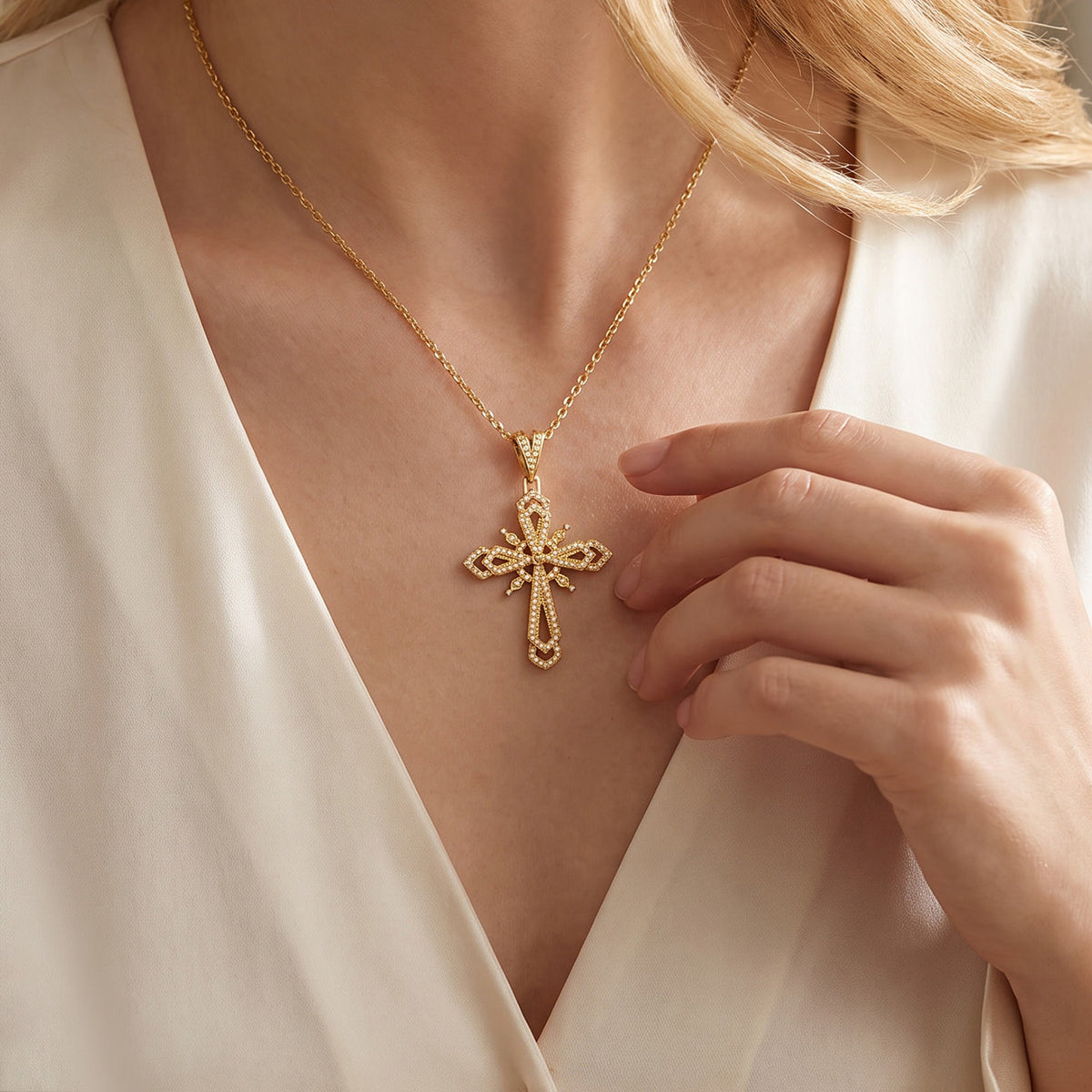 Small zircon cross necklace worn on model
