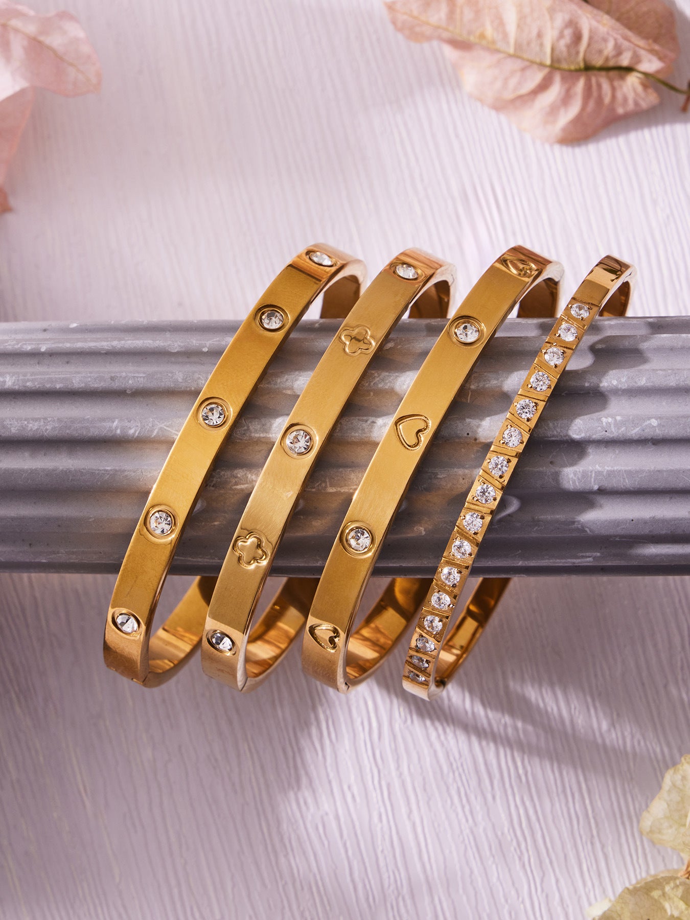 316L stainless steel 18K Gold PVD Waterproof Minimalist Open Bangle flat lay display for wholesale bangle buyers