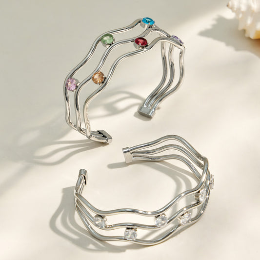 Polished steel three-layer open bangle with clear cubic zirconia accents