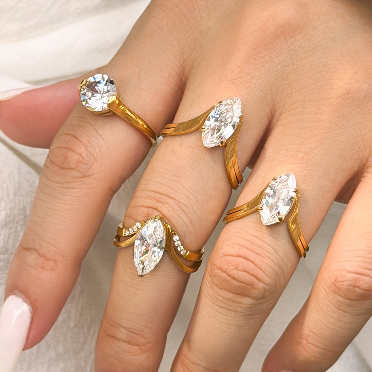 V-shaped zircon open ring with 18K PVD gold finish
