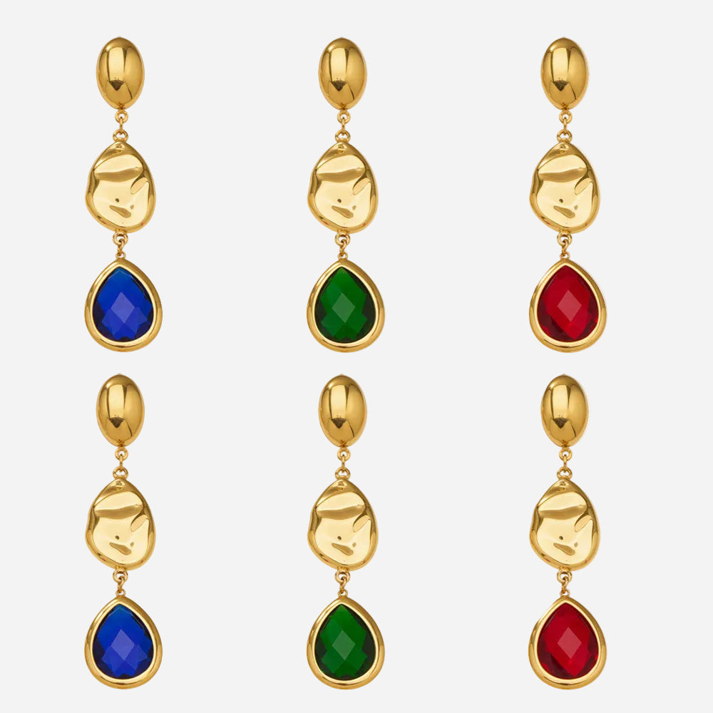 Wholesale 316L stainless steel 18K PVD gold plated Czech crystal water drop hypoallergenic earrings in blue, green, and red.