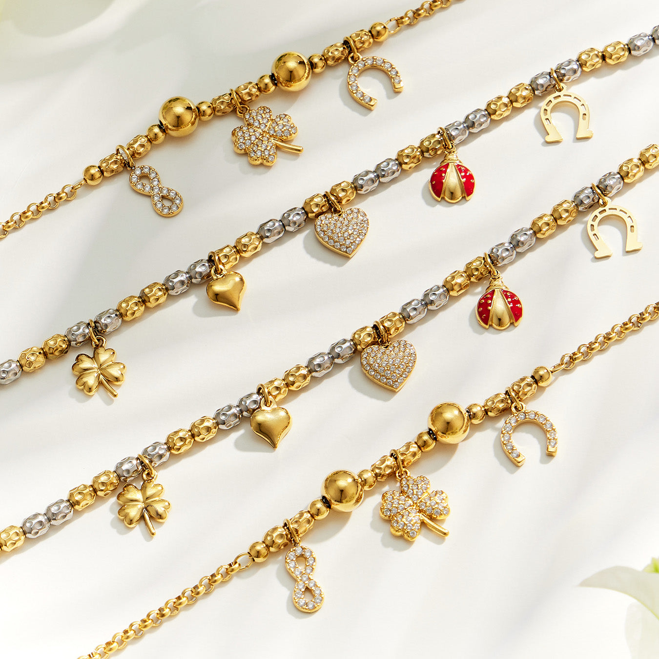 E446 gold multi charm bracelet size guide with 18 cm bracelet and extension chain