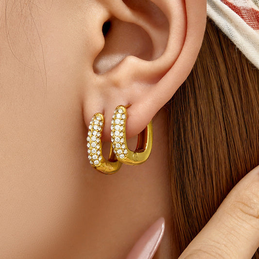 Elegant U-shaped earrings with zircon stones