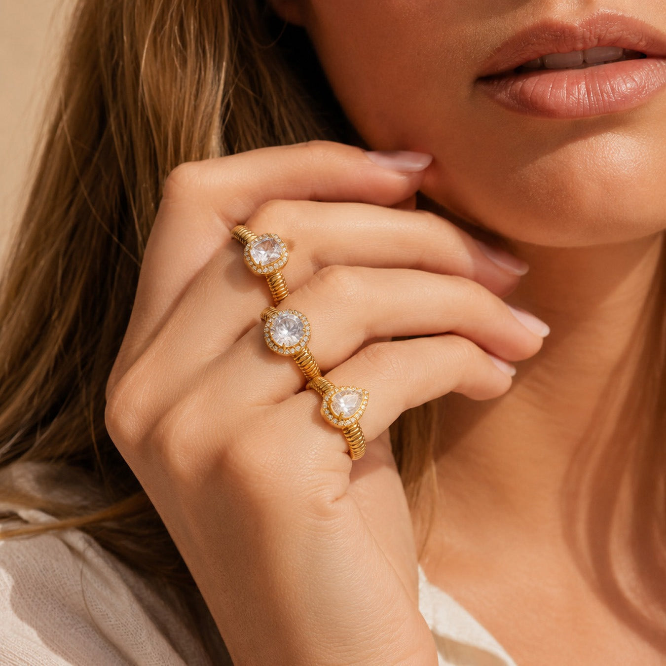 Close up of gold round and square zircon open rings worn on hand, stainless steel statement rings for boutiques