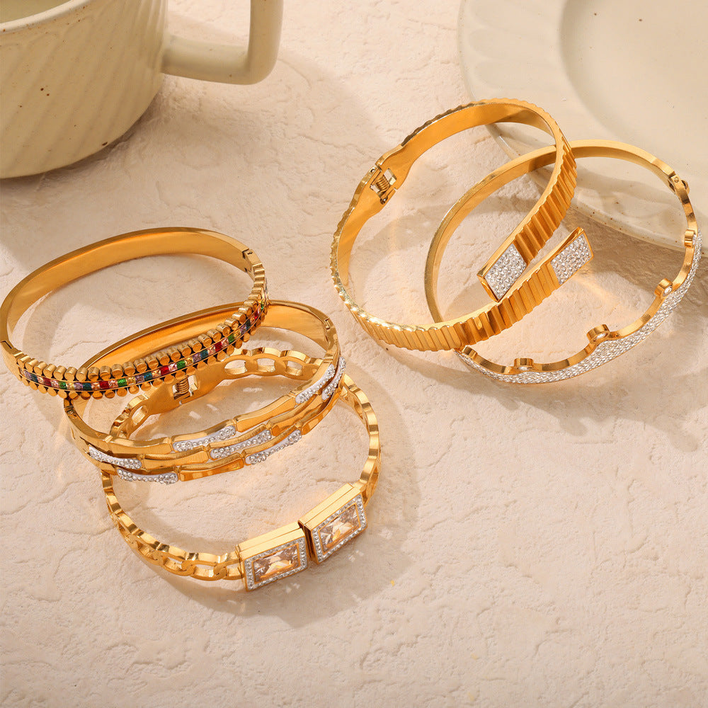18K gold plated geometric zircon bangle set, displayed on table, retro niche statement jewelry