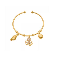 18K gold plated ocean shell/octopus bangle on white background, zircon-accented beach jewelry