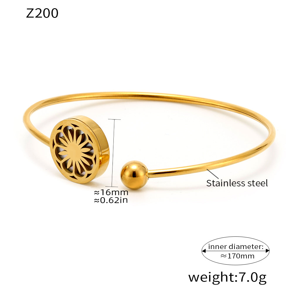 18k gold plated daisy sea shell stretch bangle: 170mm inner diameter 7.0g weight