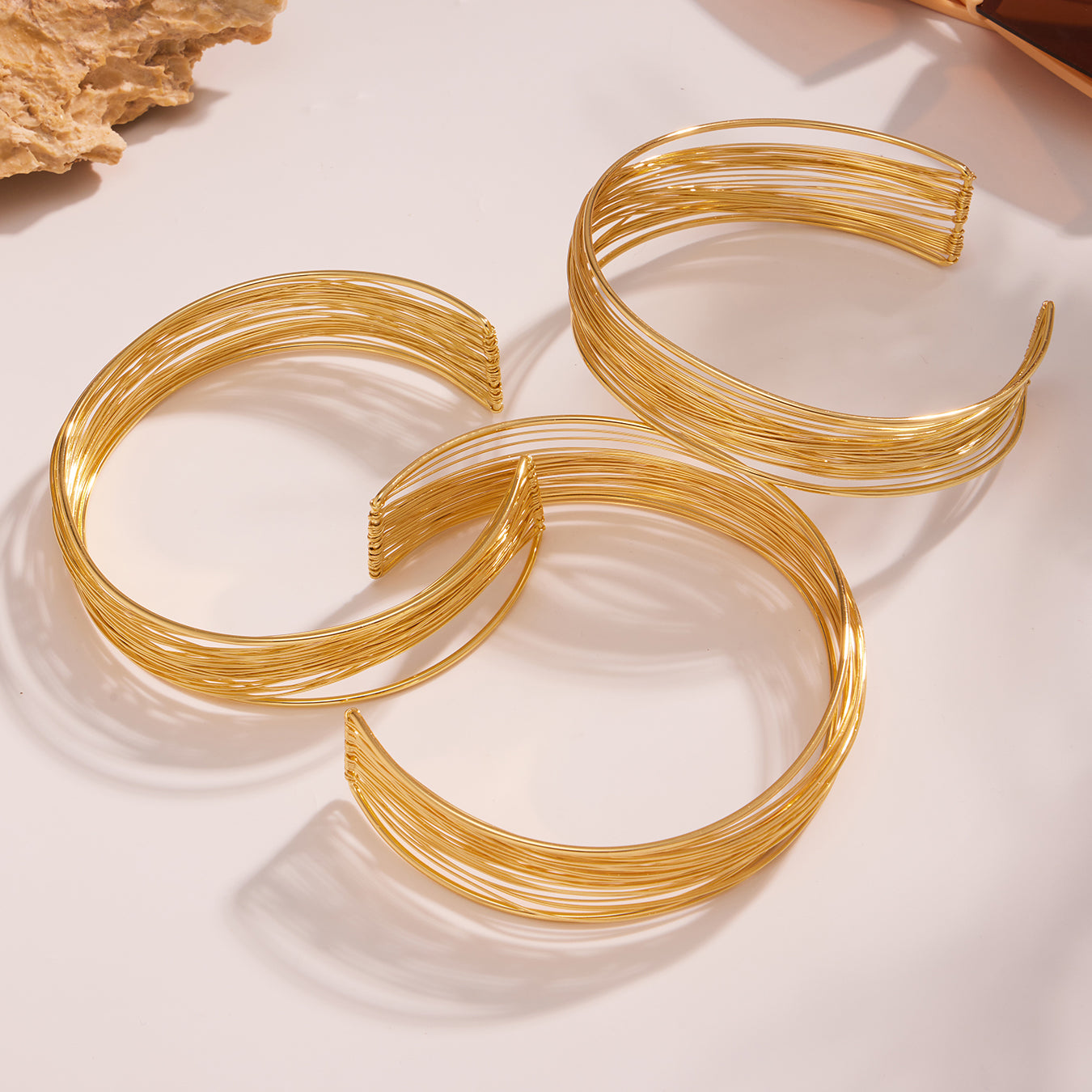 Gold 18k gold plated hand-wrapped brushed bangle set: statement open cuff design