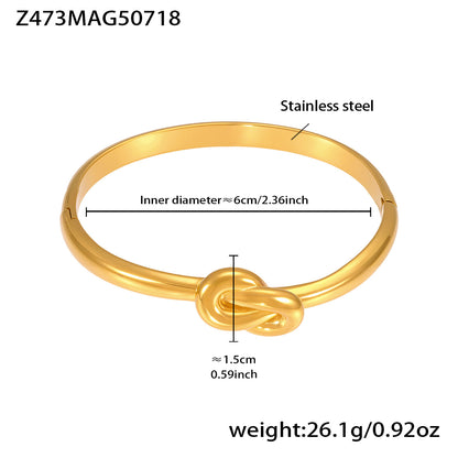 Gold 18k gold plated single knot bangle: 6cm inner diameter 26.1g weight