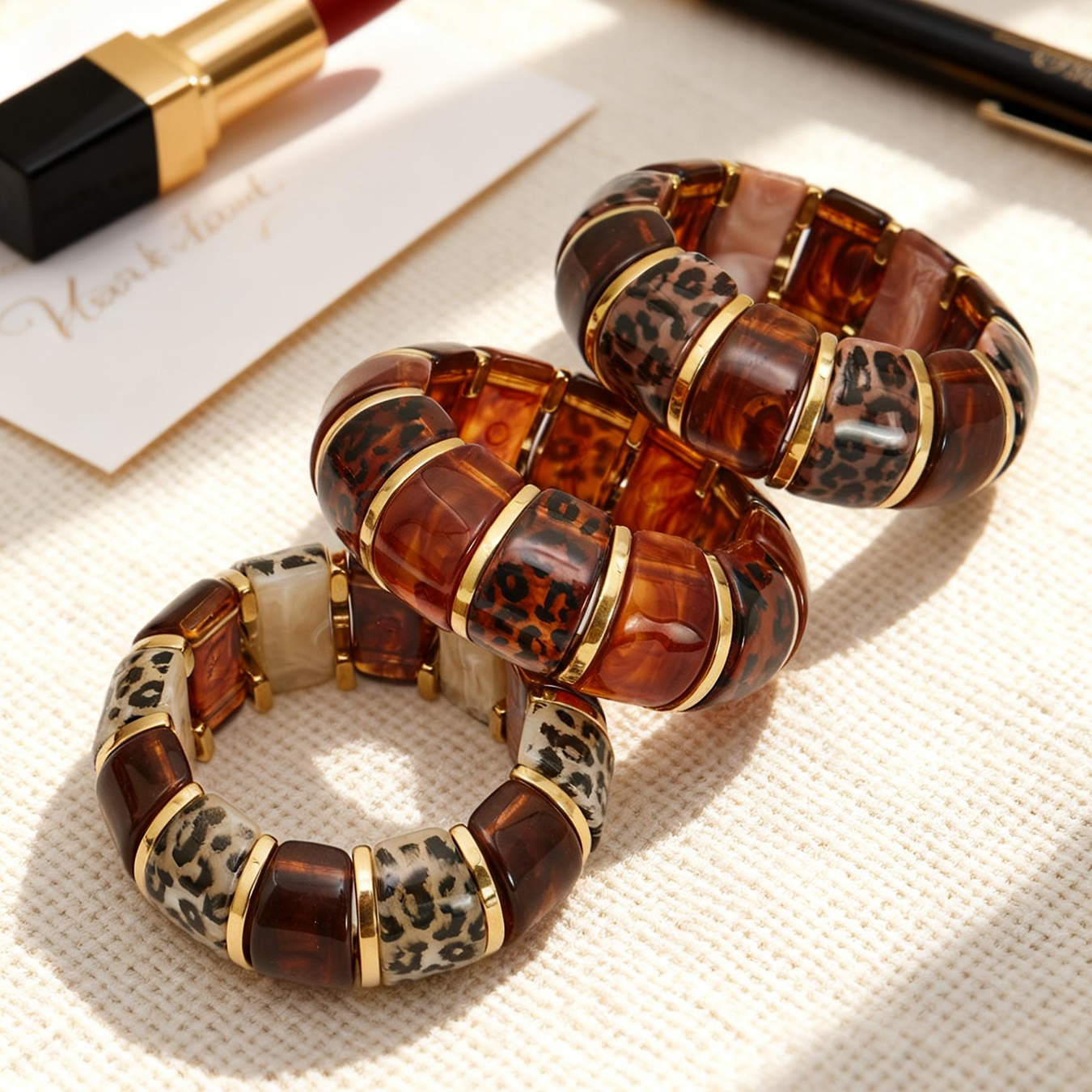 18k gold plated leopard print resin stainless steel bracelet set displayed on fabric, trendy european style jewelry