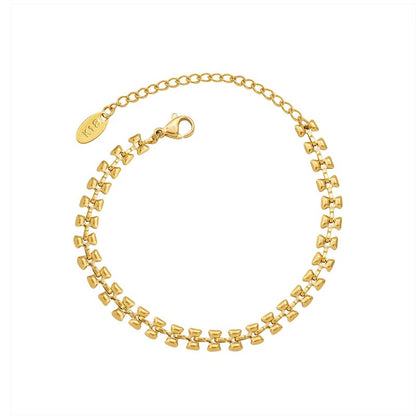 18K gold plated mixed chain bracelet worn on wrist for wholesale boutique jewelry buyers