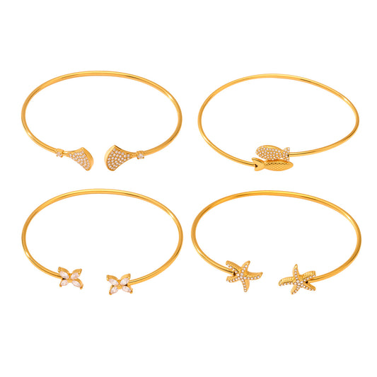 18k gold plated ocean 5A zircon bangle set collection: fish starfish design on white background