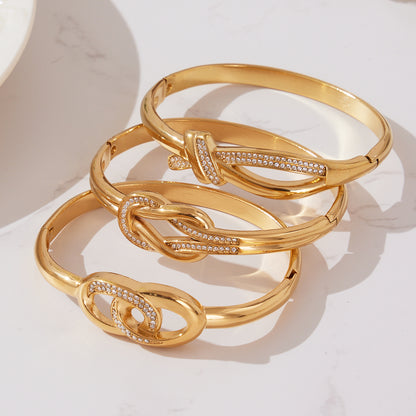18K gold plated stainless steel bangle set with zircon-embellished knot clasp design