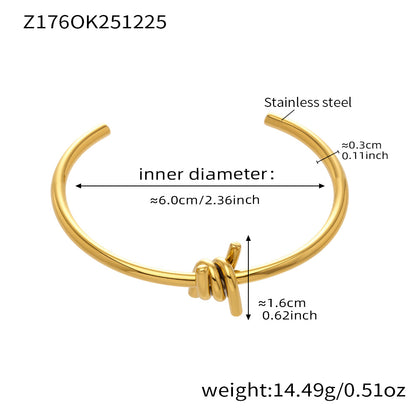 Gold 18k gold plated thin open bangle: 6.0cm inner diameter 14.49g weight coil detail