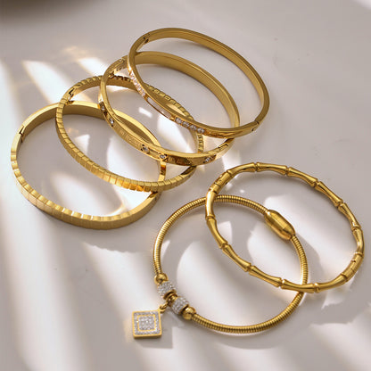 Multiple 18k gold plated zircon bangle set display, stacked jewelry for women