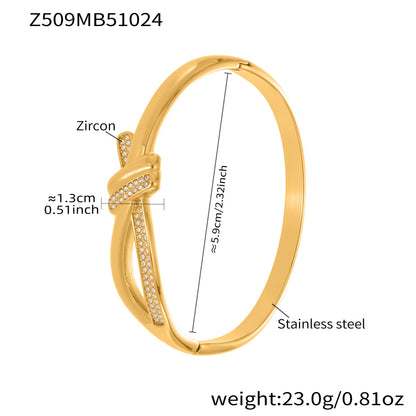 18K gold plated stainless steel bangle (Z509MB51024), zircon knot clasp, 1.3cm detail, inner diameter 5.9cm, weight 23g