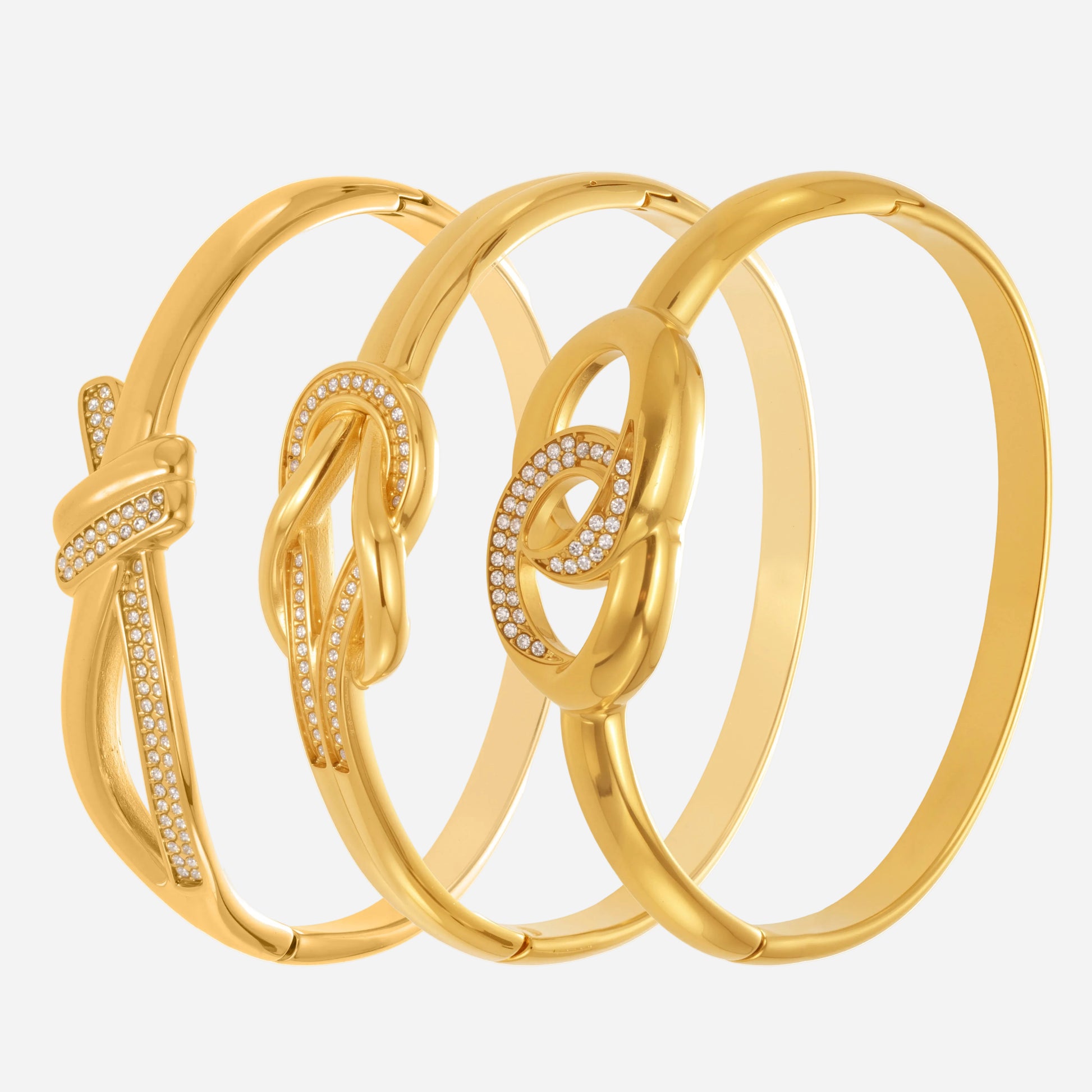 Close-up of 18K gold plated stainless steel bangle set with zircon knot clasp